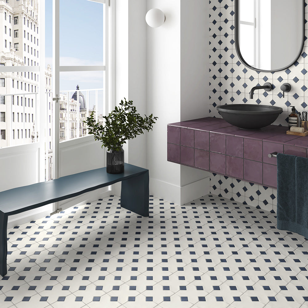 A moody, celestial ambiance highlighted by Kasbah Taco Blue Night 1X1 Matte Porcelain, perfect for dramatic and refined spaces.