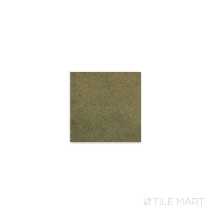 Diagonal view of Kasbah Taco Verde 1x1 matte porcelain tile, showcasing its vibrant green shade, modern matte texture, and structured small square format.  

