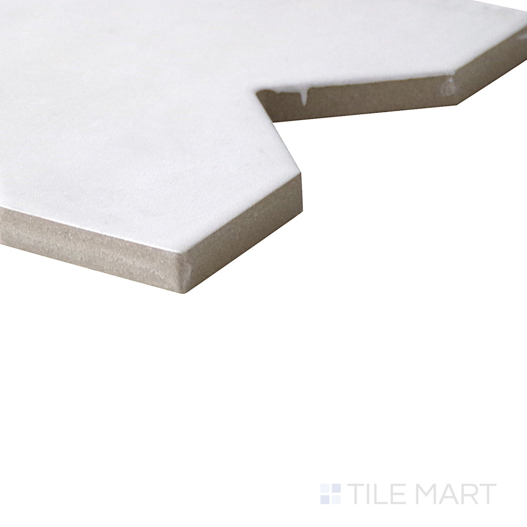 Top-down view of Kasbah Cross Bone 5x5 matte porcelain tile, featuring a subtle cross pattern with a soft matte finish in a neutral bone shade.