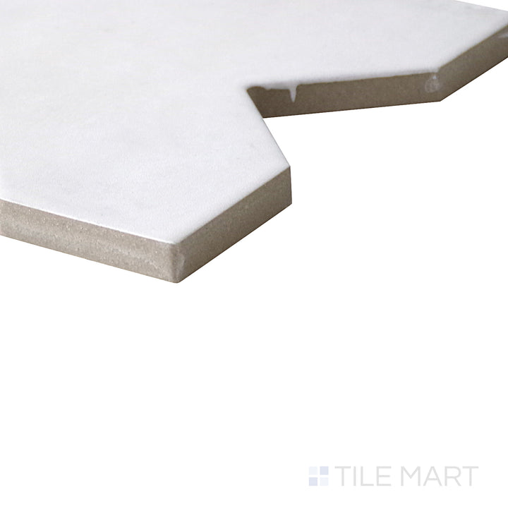 Top-down view of Kasbah Cross Bone 5x5 matte porcelain tile, featuring a subtle cross pattern with a soft matte finish in a neutral bone shade.