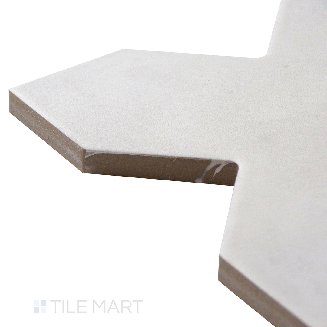 Corner angle of Kasbah Cross Bone 5X5 Matte Porcelain Tile, emphasizing its light neutral bone tones with a classic cross pattern in a matte surface.