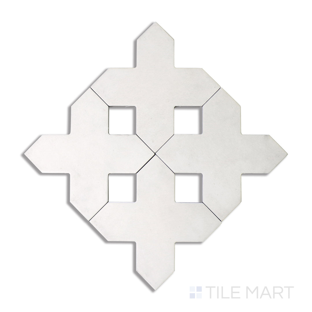 Flat-lay image of Kasbah Cross Bone 5X5 matte porcelain tile, featuring a warm bone-colored hue with a subtle cross design, adding understated elegance to surfaces.