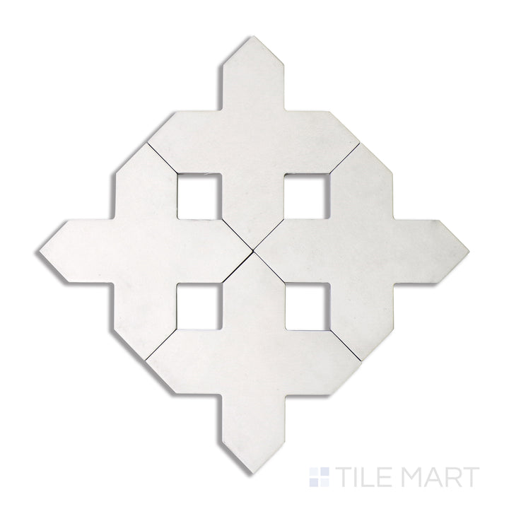 Flat-lay image of Kasbah Cross Bone 5X5 matte porcelain tile, featuring a warm bone-colored hue with a subtle cross design, adding understated elegance to surfaces.
