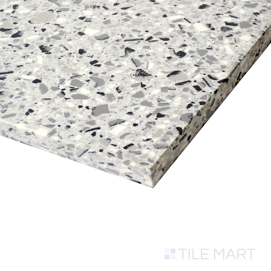 Corner-focused shot of Rialto Silver 24X24 Polished Porcelain Tile, highlighting its sophisticated silver-gray finish with a sleek, glossy surface.