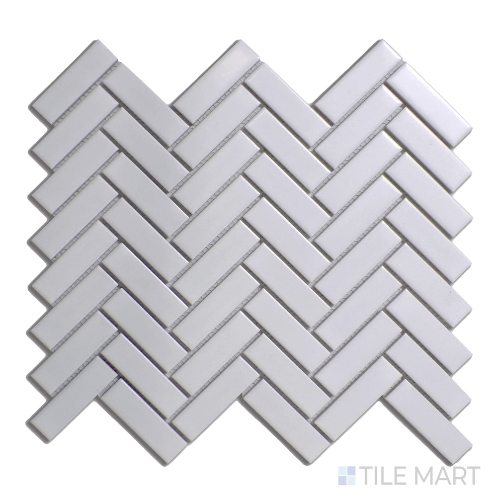 From a close-up perspective, the Porcelain Glazed Mosaics Grey Herringbone matte tile reveals its intricate layout and soft matte finish for a modern yet timeless look.