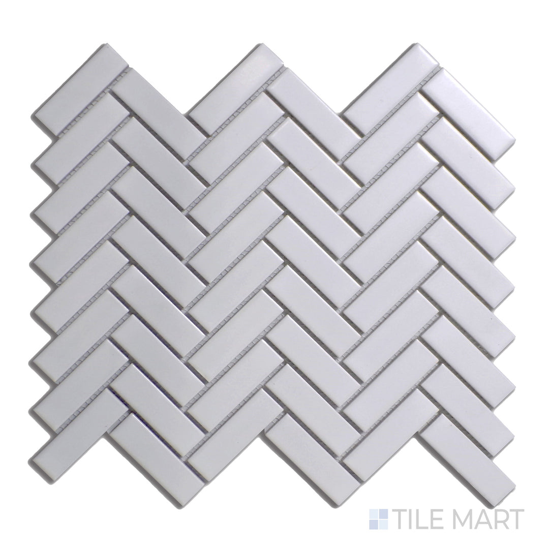 From a close-up perspective, the Porcelain Glazed Mosaics Grey Herringbone matte tile reveals its intricate layout and soft matte finish for a modern yet timeless look.