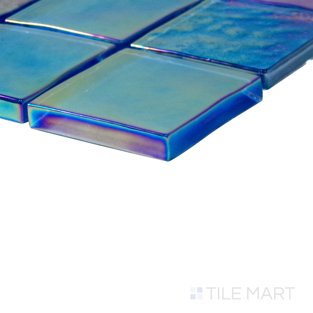 Angled shot of Vidrofina Ocean Blue 2" square glossy glass mosaic, featuring deep ocean blue hues, a smooth glossy finish, and a structured square layout.  
