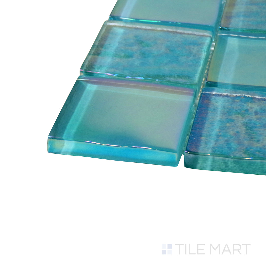 Corner angle of Vidrofina Aguamarina 2" Square Glossy Glass Mosaic, emphasizing its refreshing aqua green hues with a radiant, high-gloss effect.