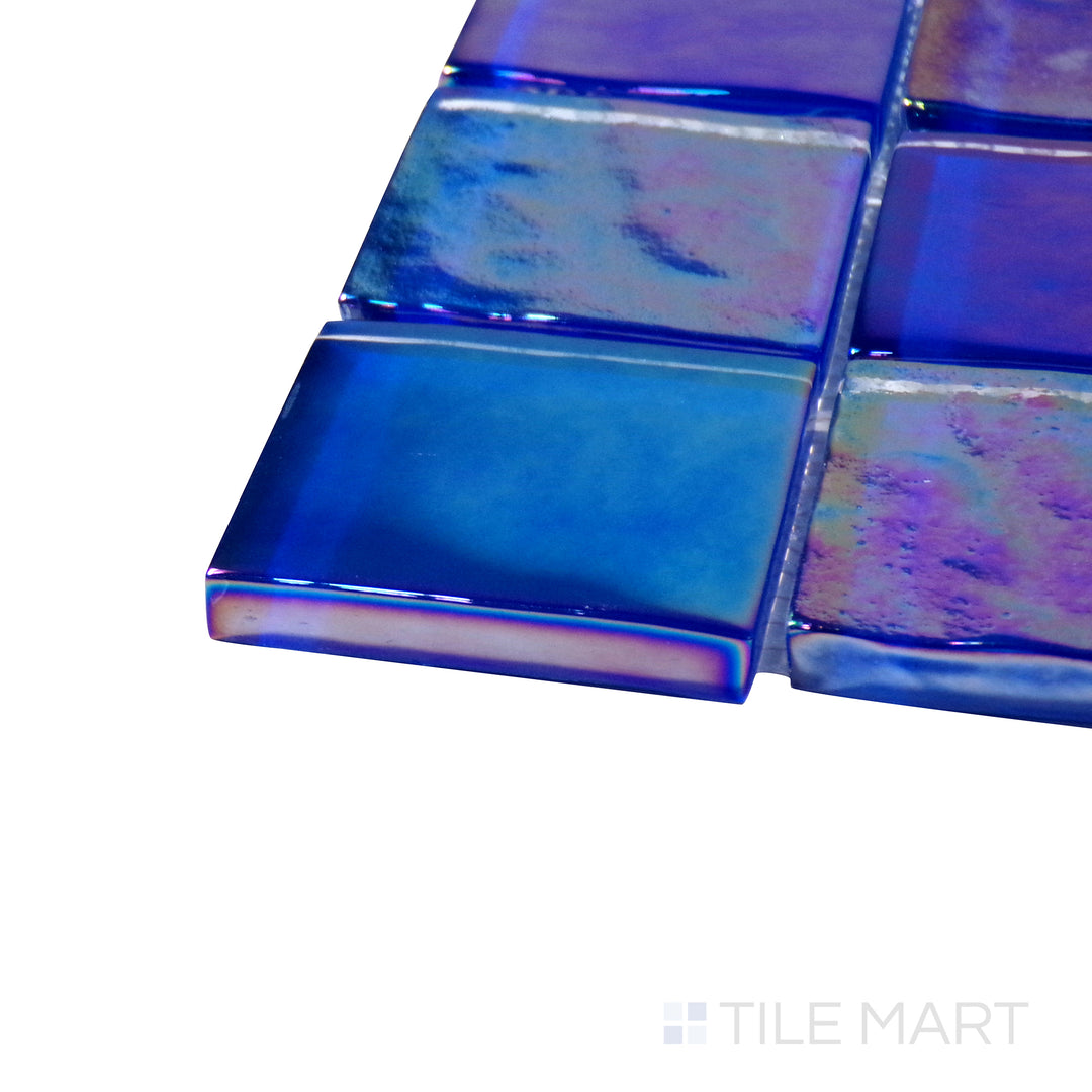 Side perspective of Vidrofina Cobalt Blue 2" Square Glossy Glass Mosaic, capturing its deep cobalt blue color with a glossy, smooth surface for a vibrant look.