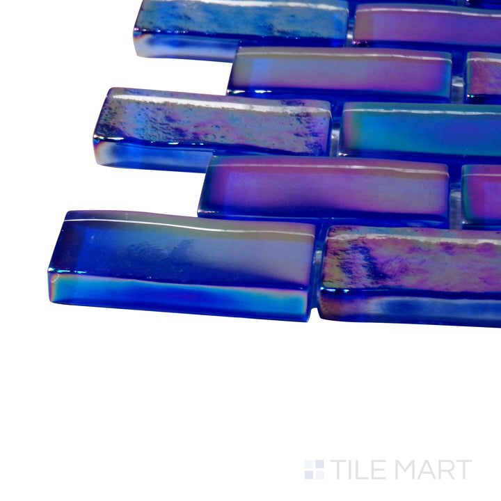 Close-up corner shot of Vidrofina Cobalt Blue Brick Glossy Glass Mosaic, featuring its deep blue hue with a sleek, reflective finish in a staggered brick pattern.