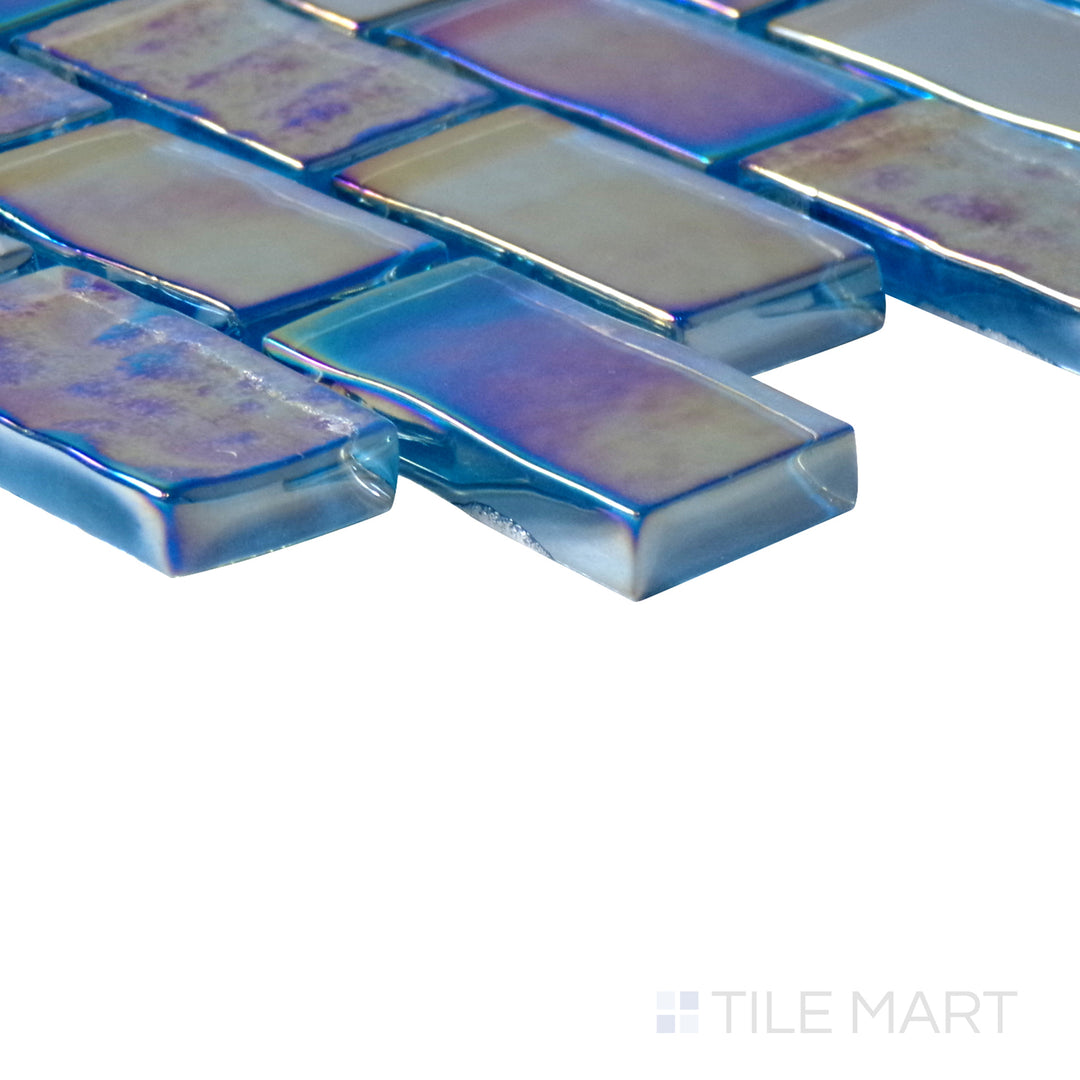 Diagonal view of Vidrofina Ocean Blue brick glossy glass mosaic, showcasing its vibrant ocean blue tones, glossy sheen, and contemporary brick design.  