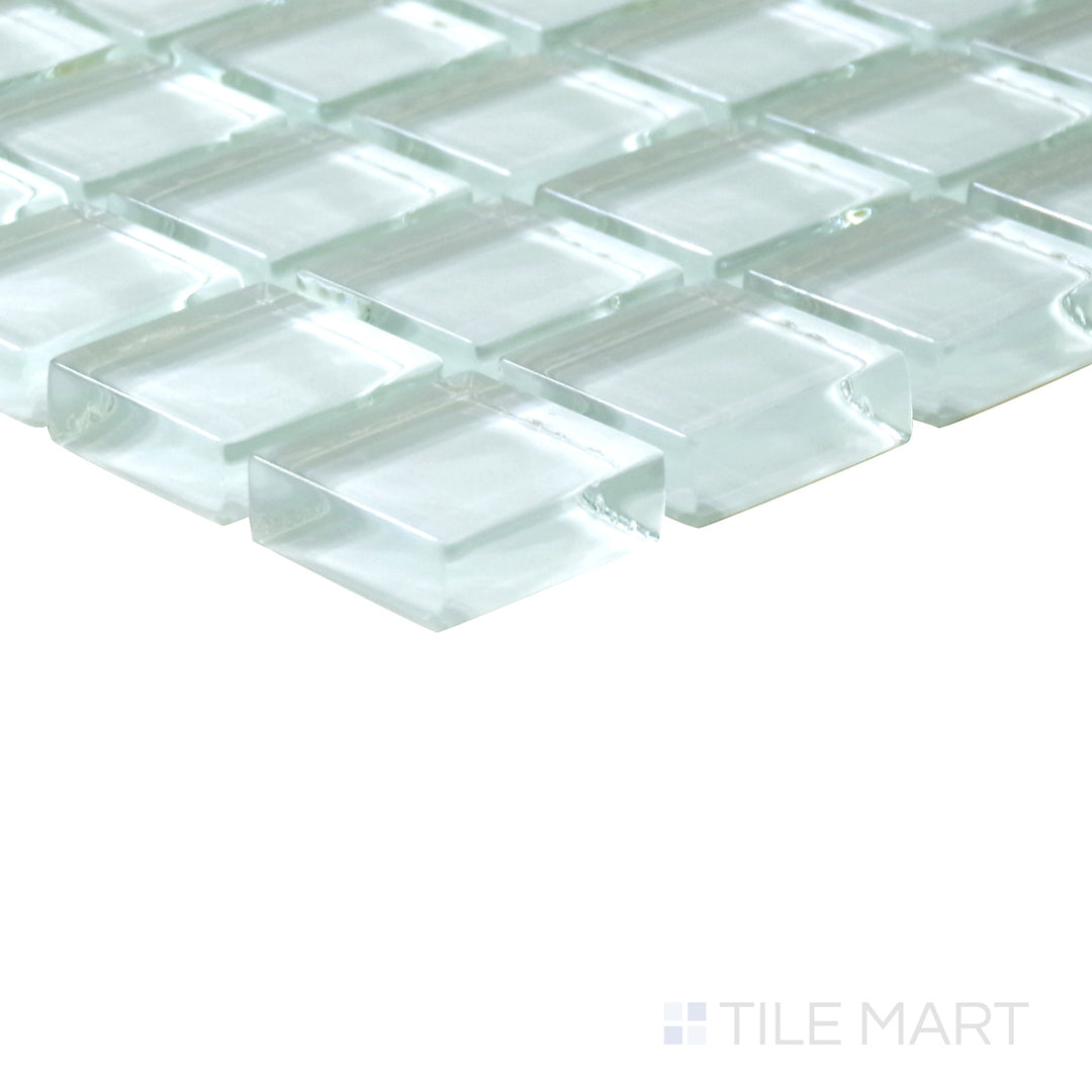 Slanted perspective of Vidrofina Maritime White 1" square glossy glass mosaic, emphasizing its crisp white tones, smooth glossy finish, and geometric square arrangement.  
