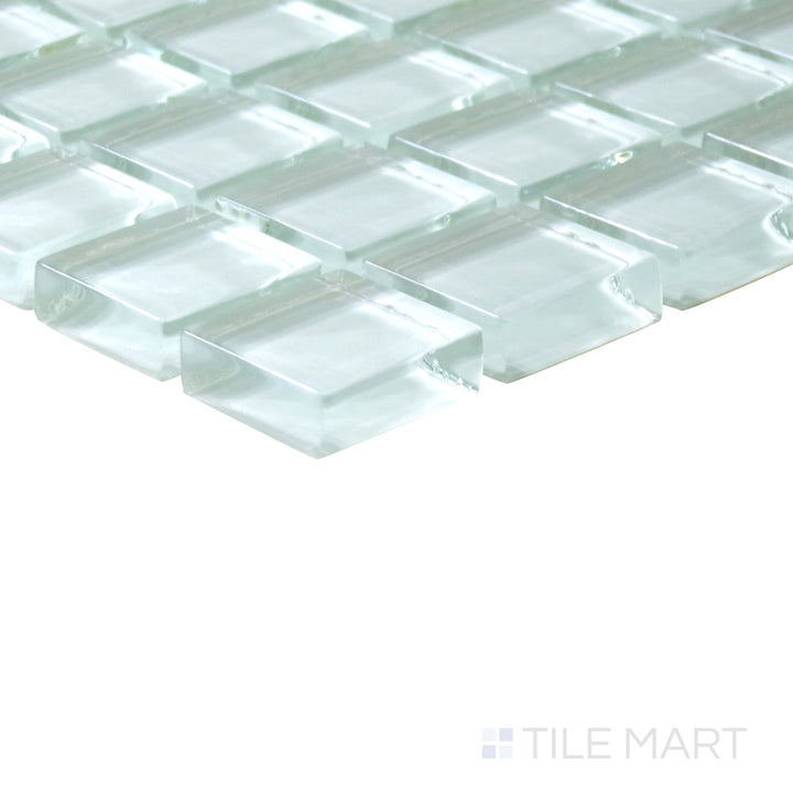 Slanted perspective of Vidrofina Maritime White 1" square glossy glass mosaic, emphasizing its crisp white tones, smooth glossy finish, and geometric square arrangement.  