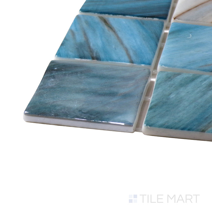 Corner shot of Onix Glass Zaira 2" Square Glossy Mosaic, showcasing its shimmering glass finish with a structured square mosaic layout.