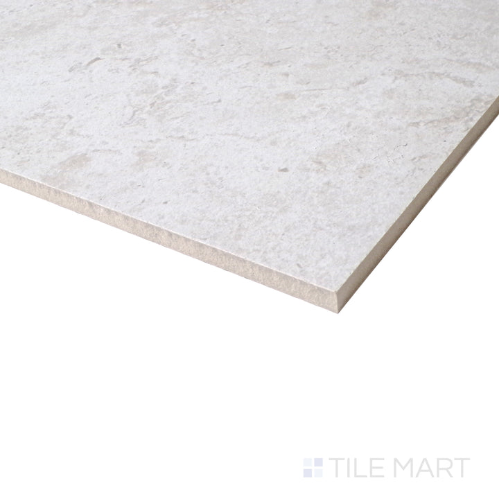 Angled shot of Astrum White 48x48 matte porcelain tile, featuring a crisp white finish, smooth matte texture, and expansive square format.  