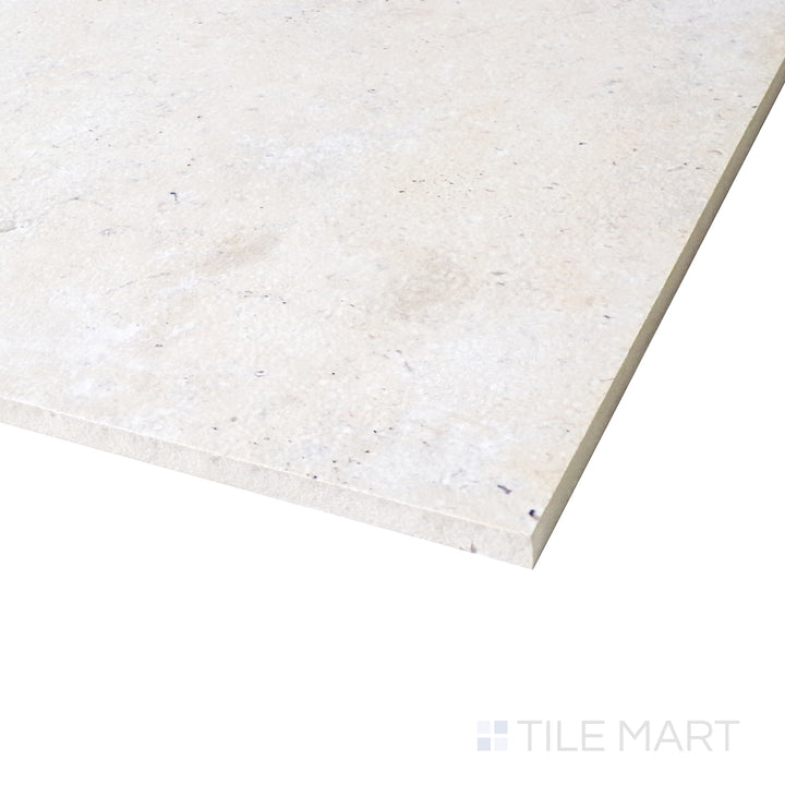 Diagonal view of Astrum Ivory 48x48 matte porcelain tile, showcasing its warm ivory tones, sleek matte surface, and large square layout.  