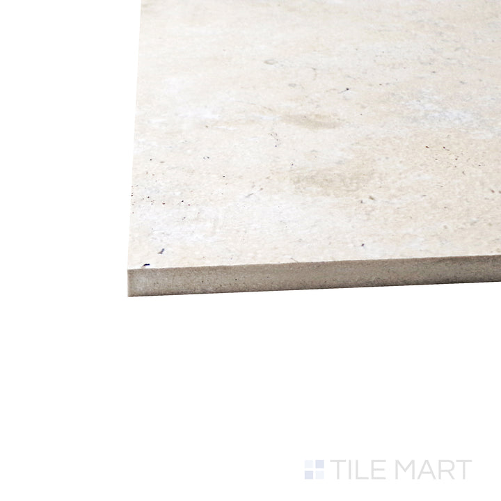 Close-up corner shot of Astrum Ivory 48X48 Matte Porcelain Tile, featuring its soft ivory tones with a natural matte texture.