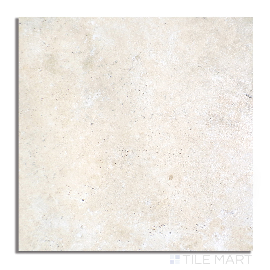 Flat-lay of Astrum Ivory 48X48 Matte Porcelain, displaying a soft ivory hue with a matte texture that adds warmth and elegance to any space.