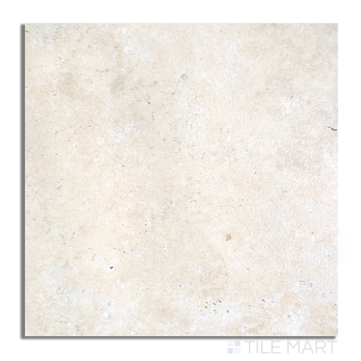 Flat-lay of Astrum Ivory 48X48 Matte Porcelain, displaying a soft ivory hue with a matte texture that adds warmth and elegance to any space.