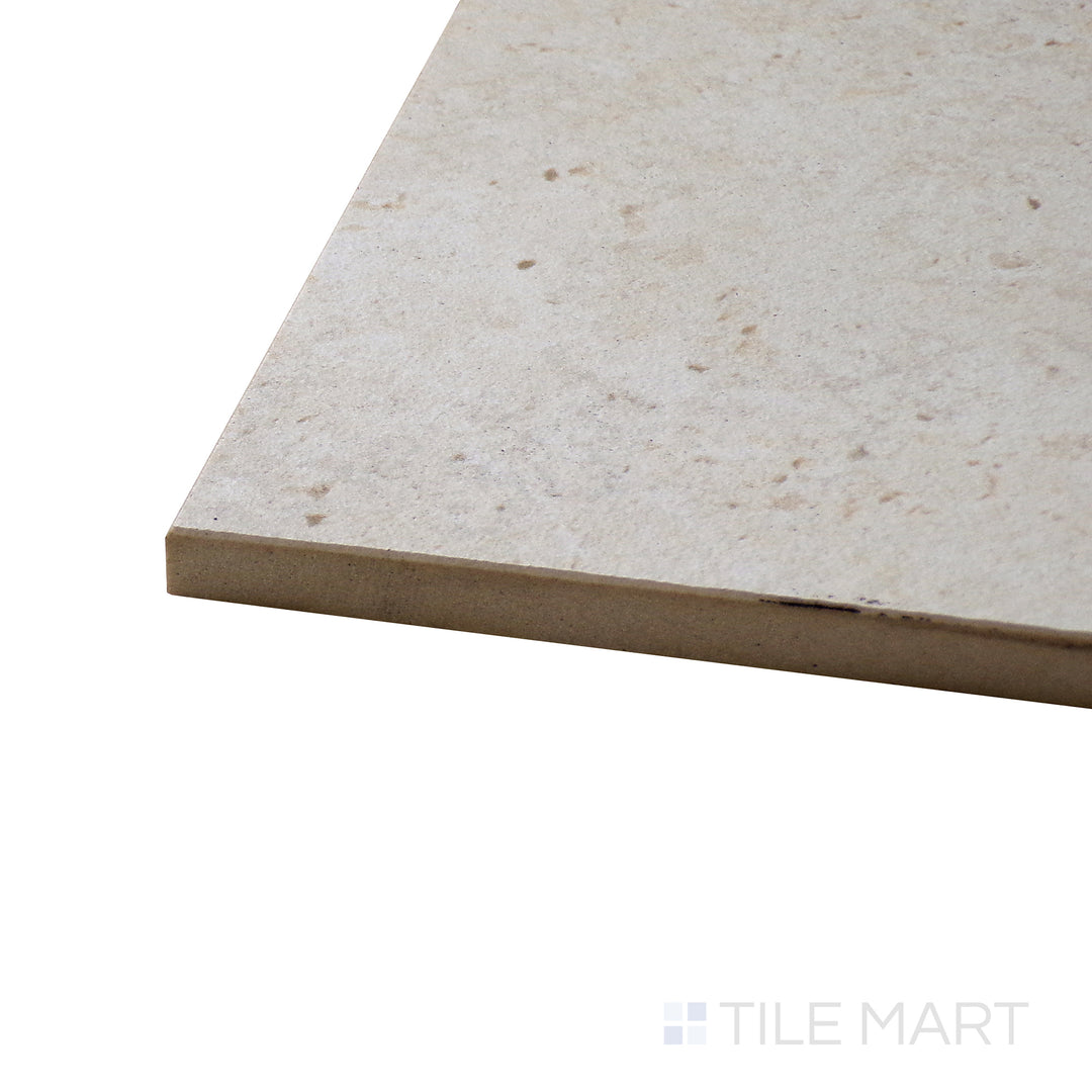 Angled close-up of Astrum White 24X48 Matte Porcelain Tile, showcasing its expansive white surface with subtle veining in a matte finish.