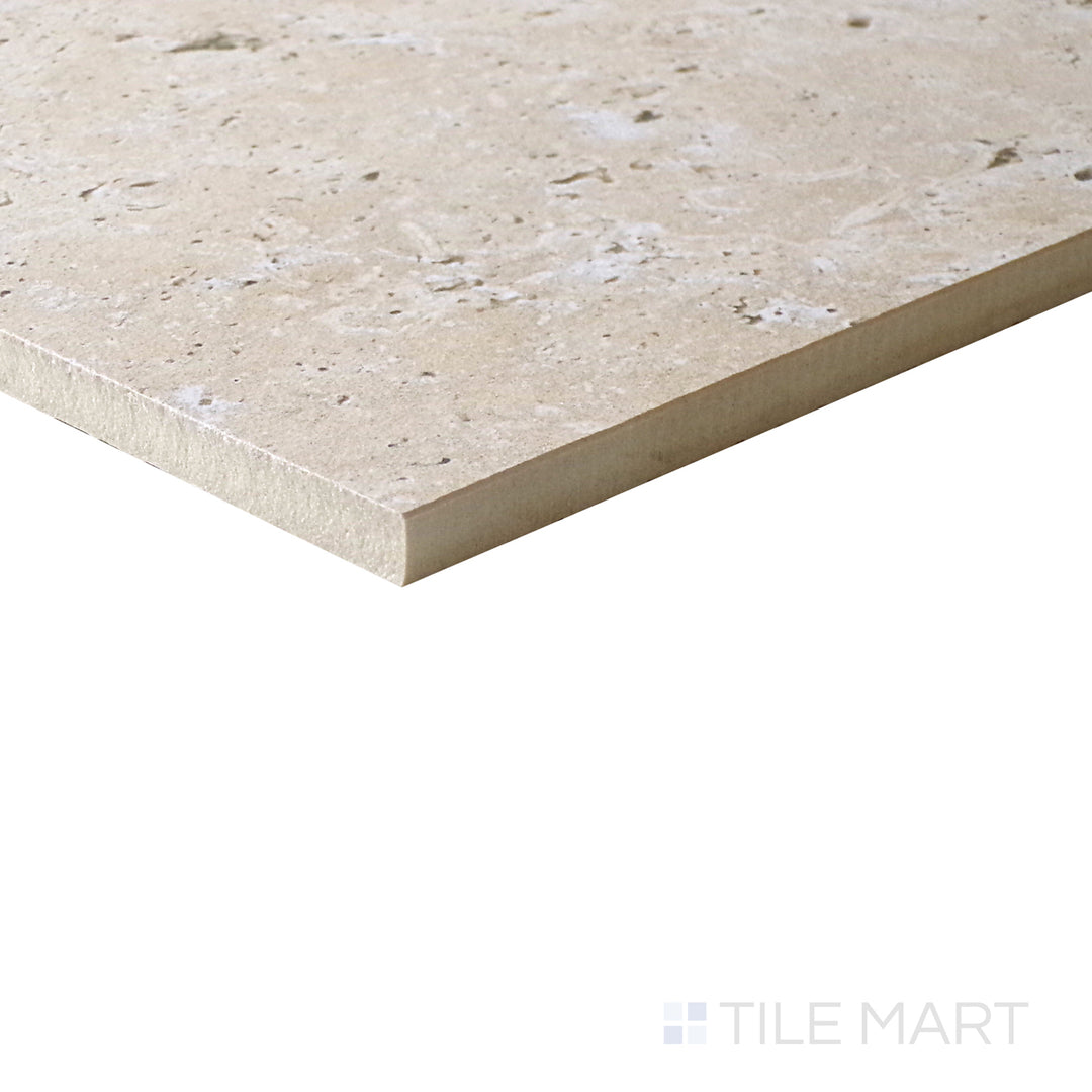 Slanted perspective of Astrum Ivory 24x48 matte porcelain tile, emphasizing its soft ivory hues, elegant matte surface, and elongated rectangular format.  