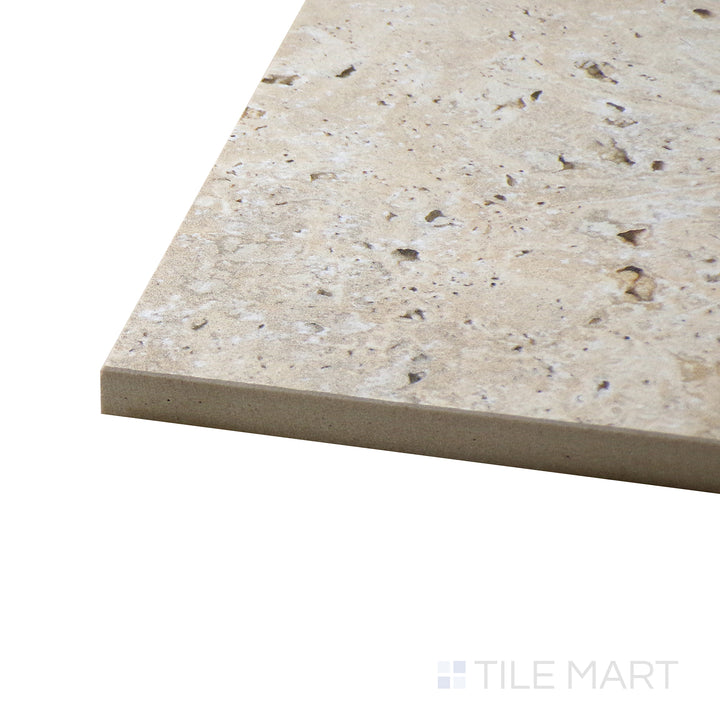 Corner-focused shot of Astrum Ivory 24X48 Matte Porcelain Tile, highlighting its warm ivory hues with a refined matte surface.