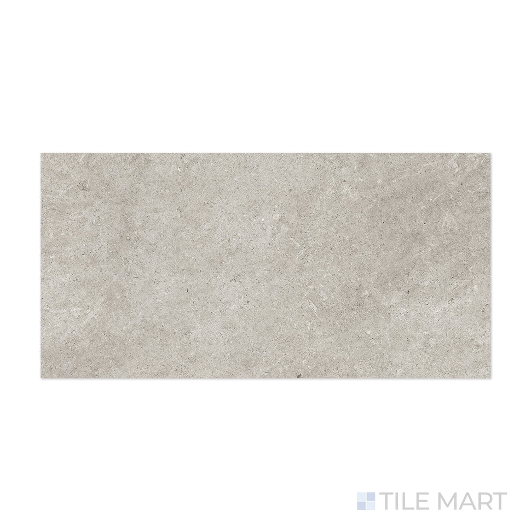 A soft pearl finish comes to life in this close-up of Epika Pearl 24x48 matte porcelain tile, where the fine matte surface enhances its gentle elegance.