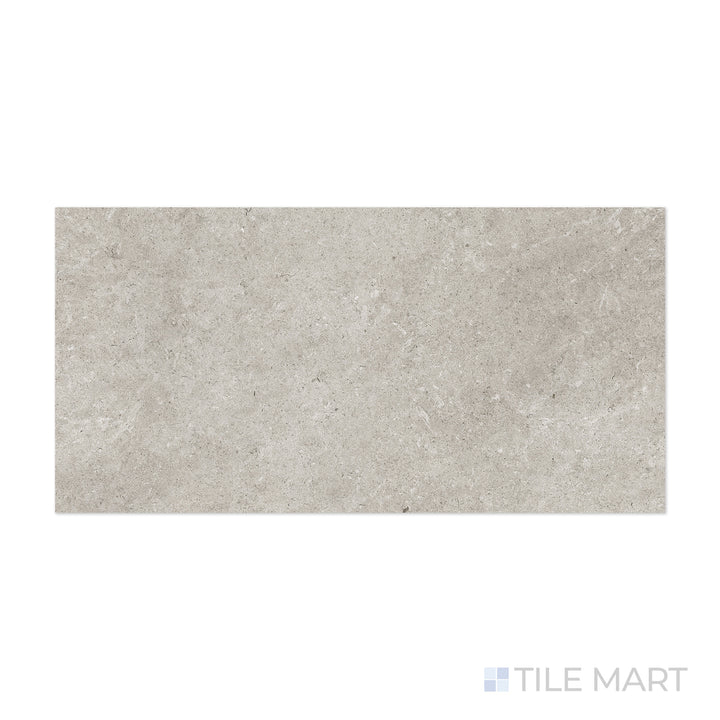 A soft pearl finish comes to life in this close-up of Epika Pearl 24x48 matte porcelain tile, where the fine matte surface enhances its gentle elegance.