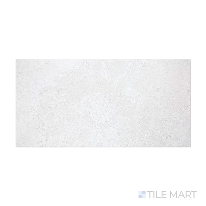 A refined blend of ivory and blue hues is showcased in this close-up of Epika Pedras Azul Ivory 24x48 matte porcelain tile, emphasizing its natural stone-inspired texture.