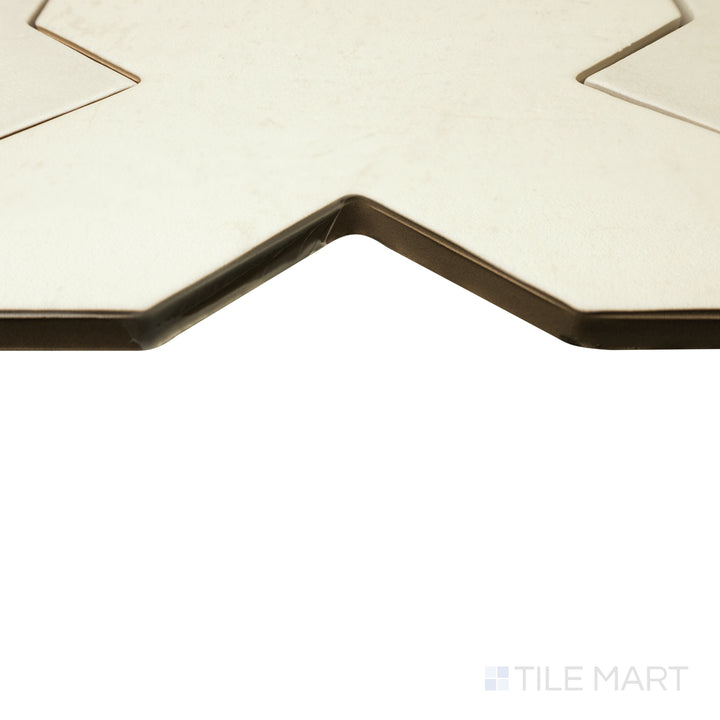 Corner view of Amalfi Cross Bone 7x7 matte porcelain tile, displaying its neutral bone shade, textured matte surface, and sharp geometric edges.