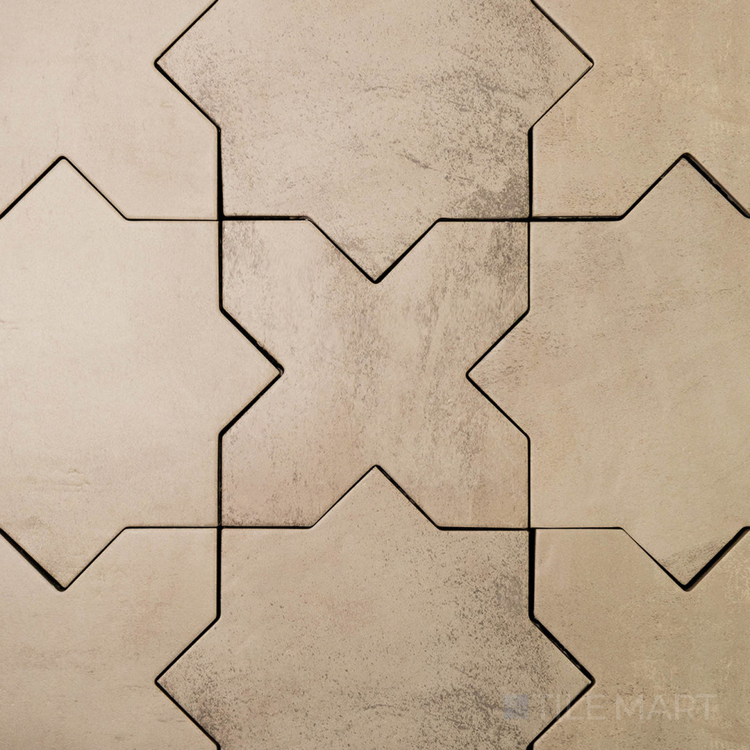 Flat-lay of Amalfi Cross Gray 7X7 Matte Porcelain, a cool gray tile with a structured cross pattern and a smooth matte surface.