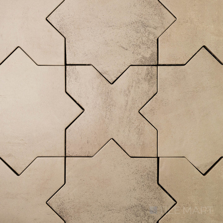 Flat-lay of Amalfi Cross Gray 7X7 Matte Porcelain, a cool gray tile with a structured cross pattern and a smooth matte surface.