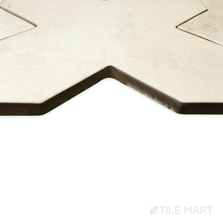 Angled perspective of Amalfi Cross Gray 7x7 matte porcelain tile, emphasizing its cool gray hue, smooth matte texture, and precise corner cut.