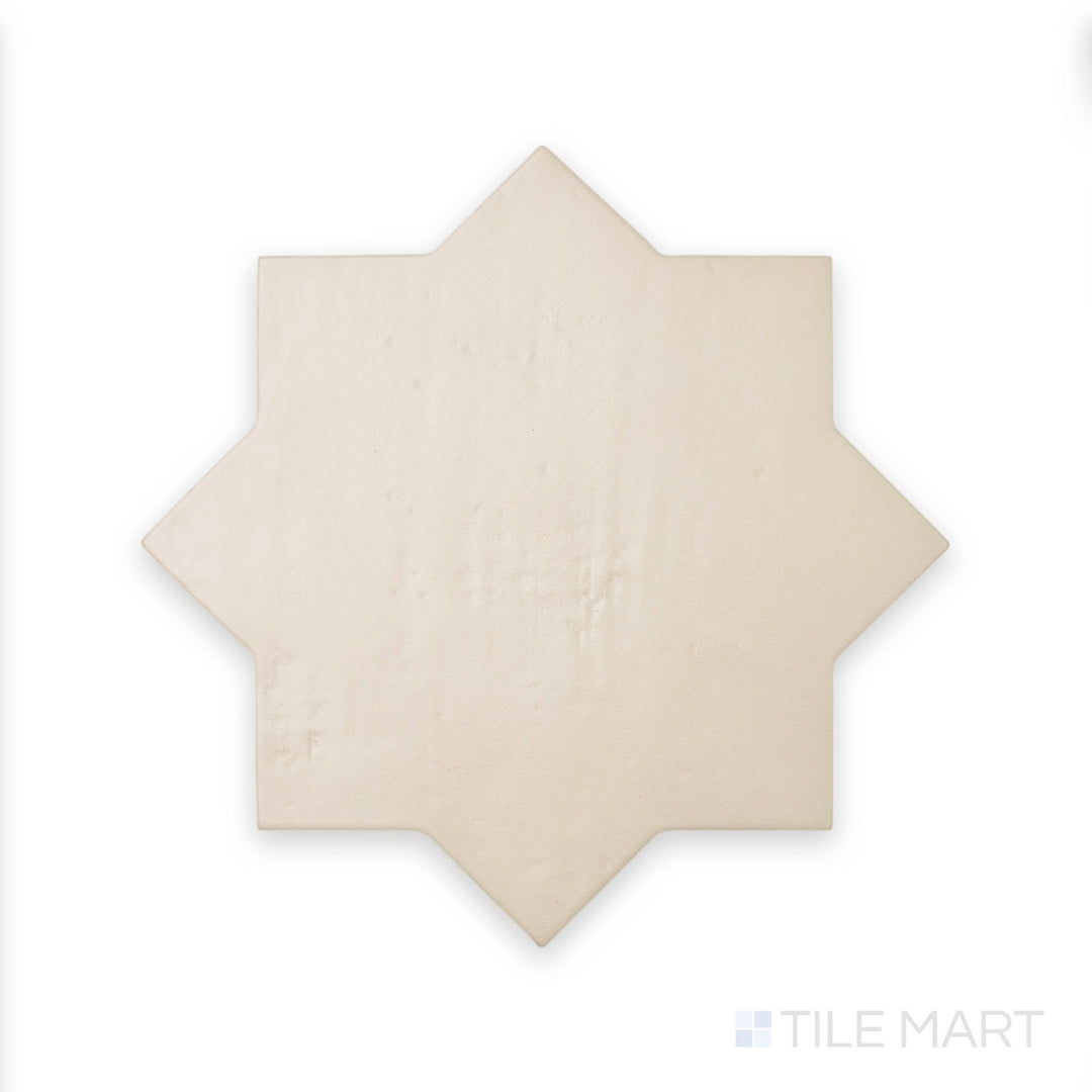 A soft bone shade with a matte cross pattern is showcased in this detailed close-up of Amalfi Star Bone 7x7 matte porcelain tile, enhancing its vintage-inspired aesthetic.