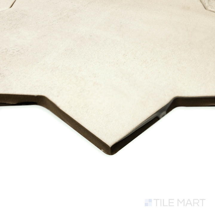 Angled view of Amalfi Star Gray 7x7 matte porcelain tile, focusing on the symmetrical star pattern, sharp corners, and smooth matte texture.