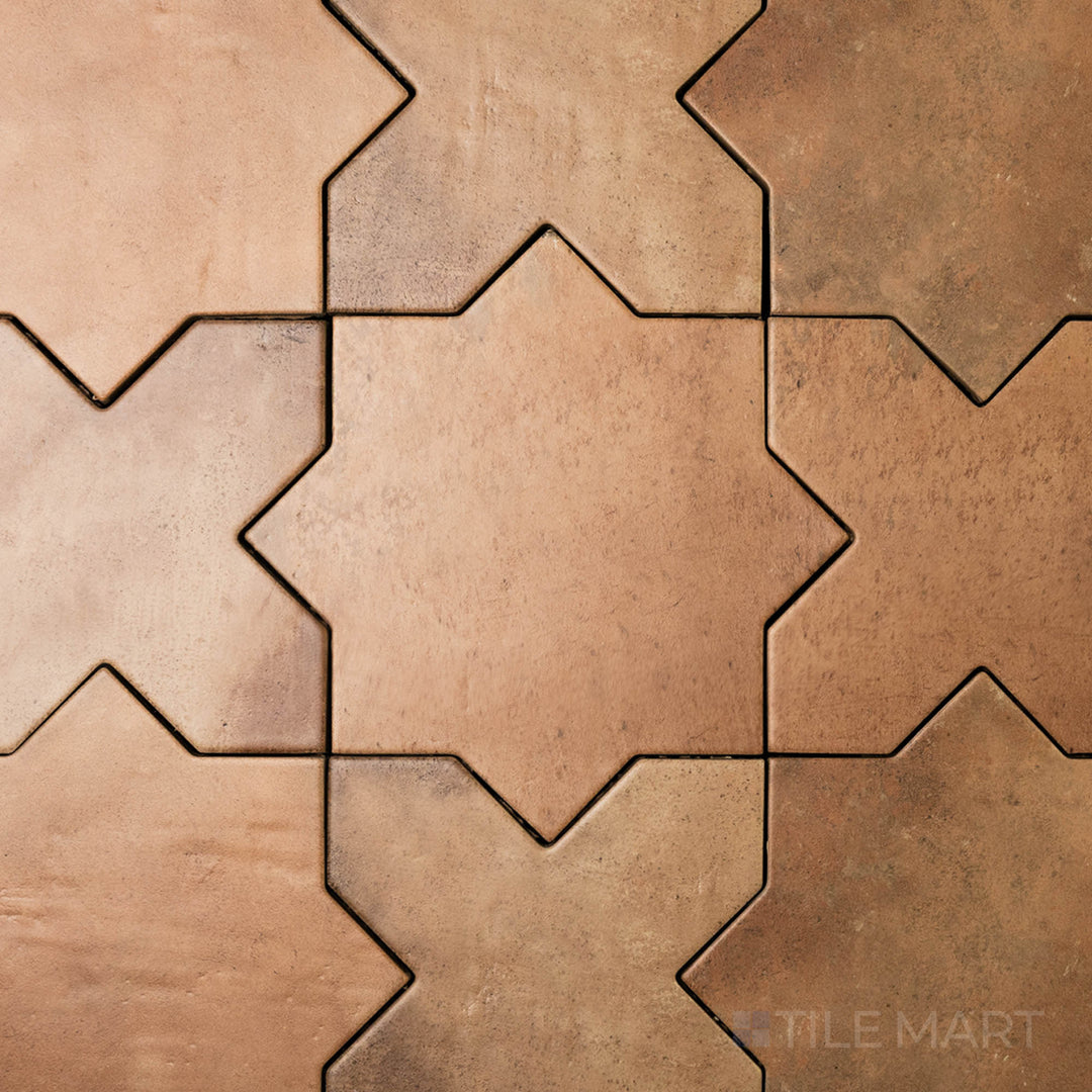 Top-down view of Amalfi Star Terracota 7X7 Matte Porcelain, a classic terracotta tile with an intricate star motif and a matte finish.