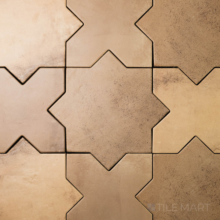 Flat-lay of Amalfi Star Mud 7X7 Matte Porcelain, a deep brown tile with a decorative star pattern and a contemporary matte finish.