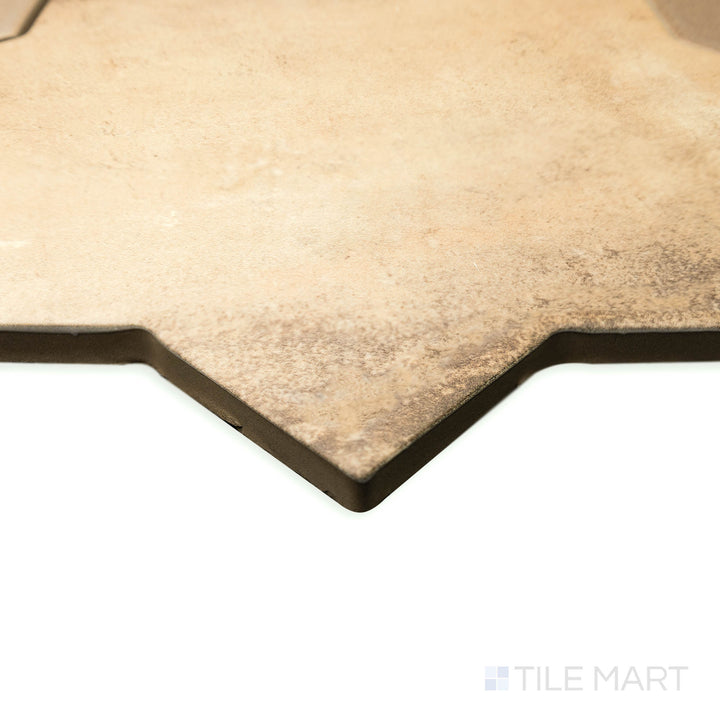 Angled close-up of Amalfi Star Mud 7x7 matte porcelain tile, displaying its earthy brown shade, crisp edges, and soft matte finish.