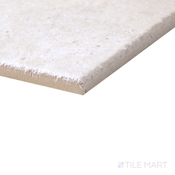 Corner shot of Jerusalem Avorio matte porcelain tile in Versailles pattern, soft beige stone-look finish.