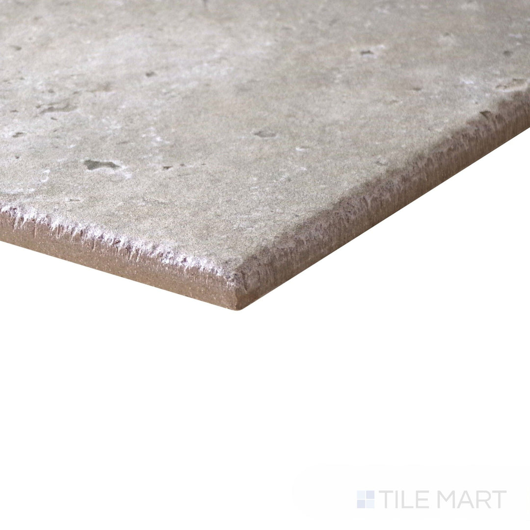 Corner angle of Jerusalem Grigio matte porcelain tile, cool grey tones in Versailles layout.