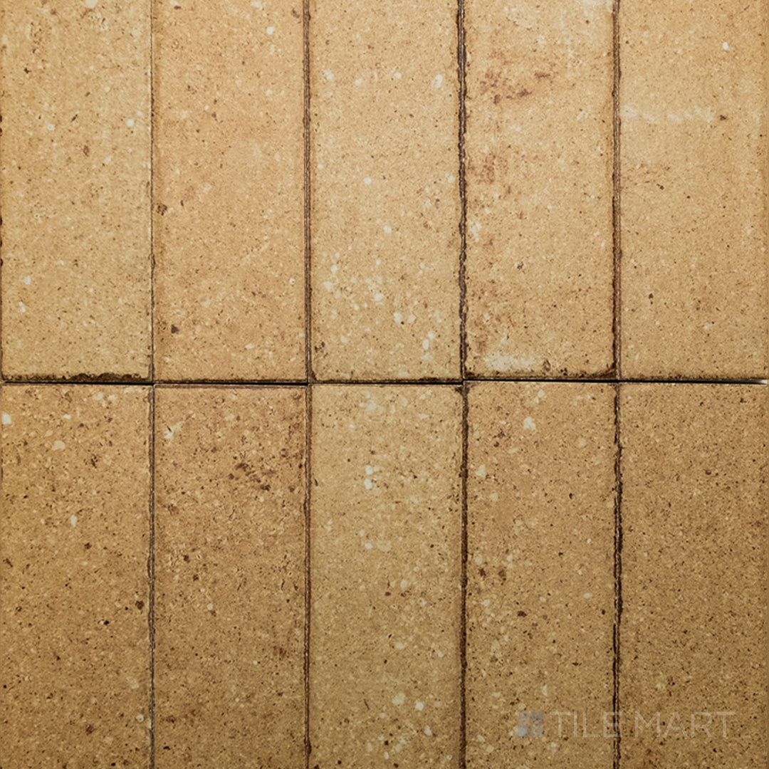 Flat-lay of Block Sand 2X8 Matte Porcelain, a soothing sandy-tone tile with a matte porcelain finish, bringing a natural feel to interiors.