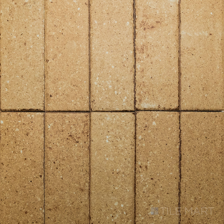 Flat-lay of Block Sand 2X8 Matte Porcelain, a soothing sandy-tone tile with a matte porcelain finish, bringing a natural feel to interiors.