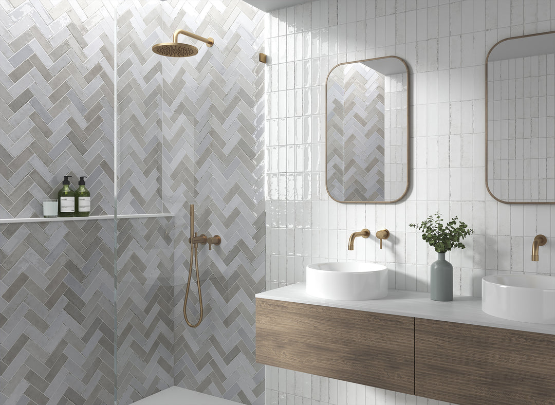 A modern and versatile setting enhanced by Calpe Greige 2X6 Glossy Porcelain, balancing neutral hues with a glossy sheen.