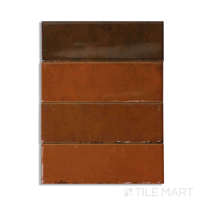 Overhead shot of Calpe Terra 2X6 Glossy Porcelain, a rich earthy-toned tile with a glossy finish, offering warmth and depth to any space.