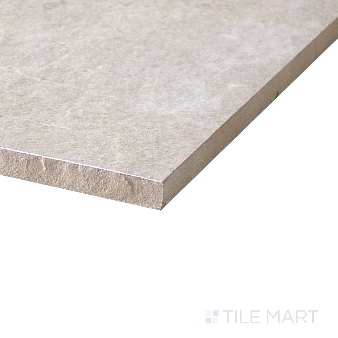 Slanted perspective of Dome Nut 24x48 matte porcelain tile, emphasizing its rich nut brown tone, smooth matte texture, and elongated rectangular shape.  