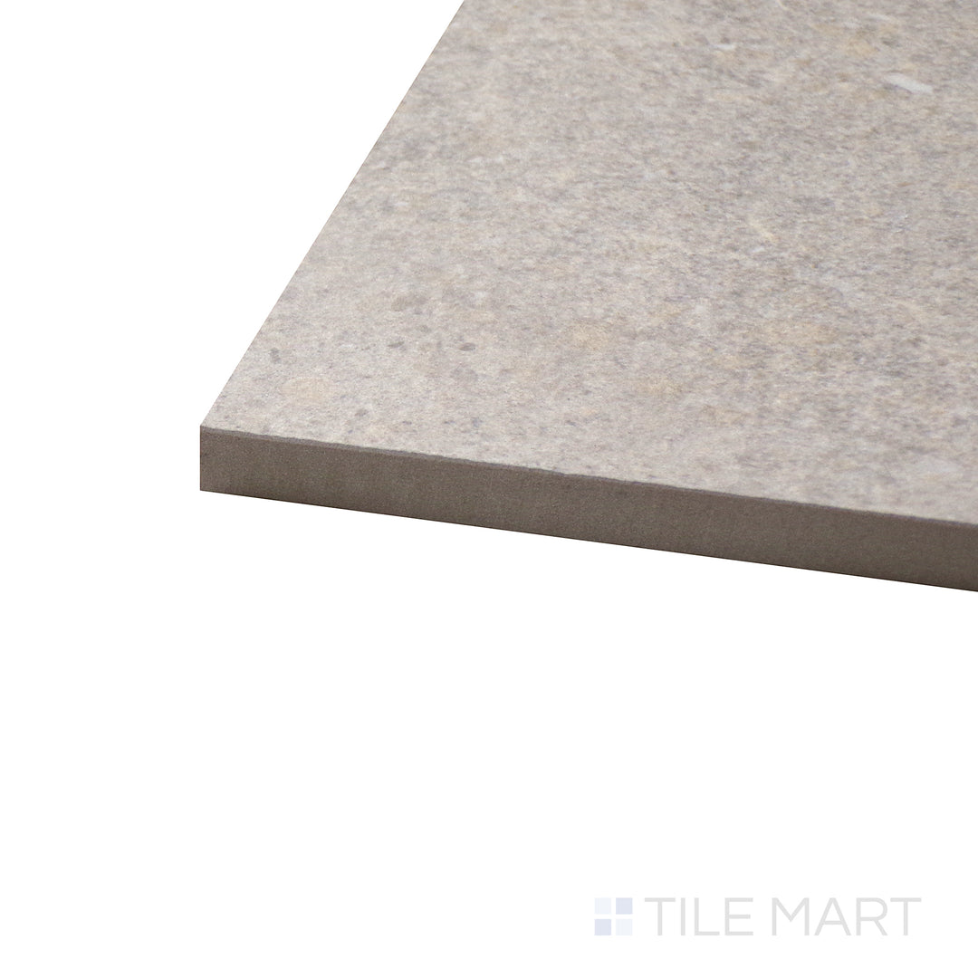 Angled close-up of Dome Nut 24X48 Matte Porcelain Tile, showcasing its warm nut-brown tones with a soft, natural matte surface.