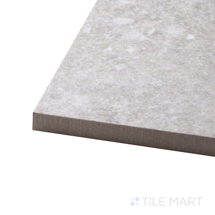 Corner-focused shot of Dome Bone 48X48 Matte Porcelain Tile, highlighting its expansive size and refined, earthy tones with a smooth matte texture.