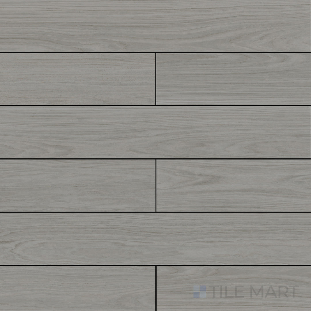 Flat-lay of Dover White 10X60 Matte Porcelain, a bright white, elongated tile with a smooth matte surface, ideal for a modern minimalist aesthetic.