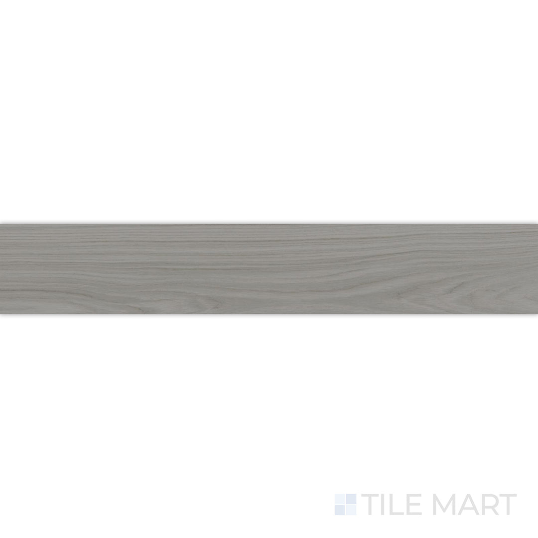 A crisp white finish with a soft matte texture is showcased in this close-up shot of Dover White 10x60 matte porcelain tile, adding brightness and elegance to the design.