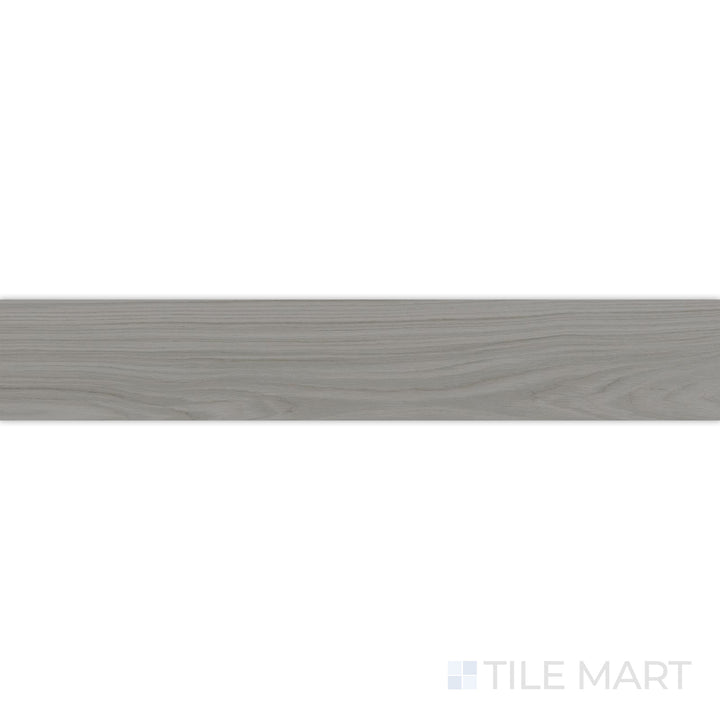 A crisp white finish with a soft matte texture is showcased in this close-up shot of Dover White 10x60 matte porcelain tile, adding brightness and elegance to the design.